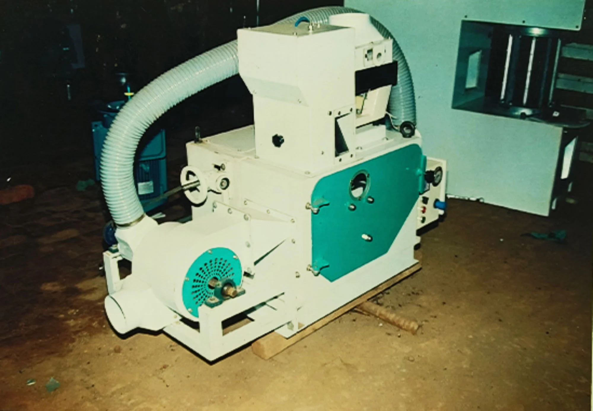 First Husker Machine